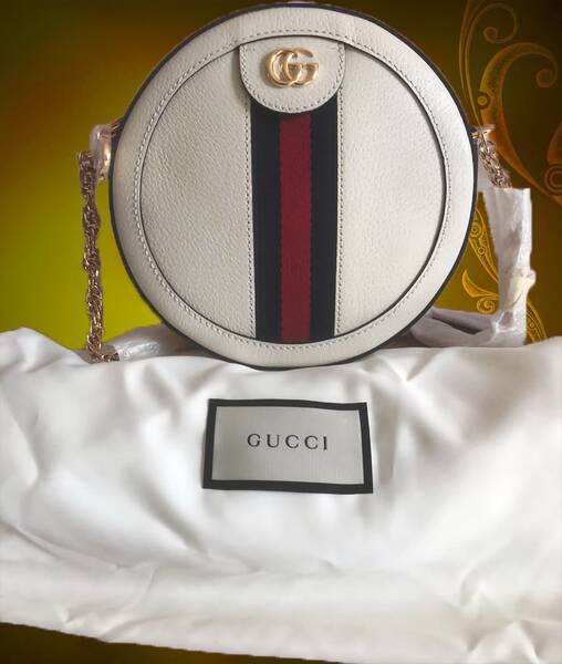 How do I clean and care for the Gucci Ophidia Shoulder Bag